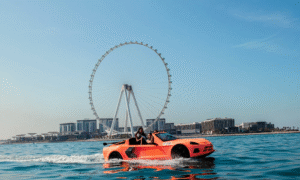 Jetski car glides past Dubai skyline